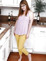 Amateur solo BBW stripping off in the kitchen opens up hairy vagina