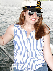 Busty captain Holly Fuller on the boat