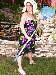 Cristine Ruby masturbates her older pussy outdoors