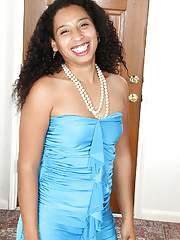 Ebony MILF Theresa Long slides out of her elegant dress to spread