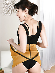 Fuckable mature in a skirt showing off hairy cunts