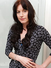 Horny mature slut playing with her dildo