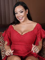 Lady in red Kitten Latenight takes off her dress and exposes her big tits