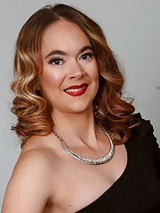 Mature Quinn Adams takes off her tight dress and displays her erect nipples