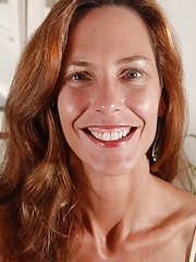 Mature Redhead Spreading Her Ass