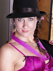 Mature stimulates her pierced pussy with a vibrator