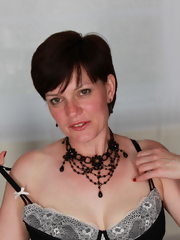 Naughty British housewife getting frisky