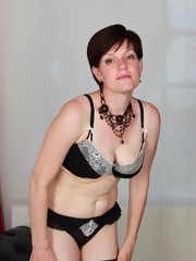 Naughty British housewife getting frisky