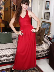 Older granny removing her tiny thong underwear and inserts a dildo into her pussy