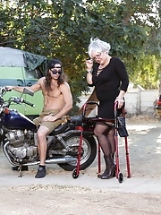 Pornstar Grandma Kelly Leigh In a Walker Posing Outdoors