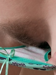 Skinny mom Natinella taking off her clothes and plays with her hairy pussy