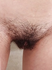 Skinny short haired mamma releases her tiny tits and shows her bush