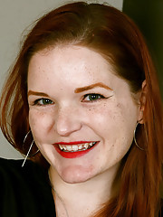 Redhead Ivy Blair Sheds Black Silk Robe And Lingerie To Pose Nude