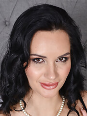 Flat chested goddess Megan Venturi poses in her sexy black and red lingerie