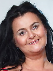 Hot mature lady with huge natural breasts getting naughty