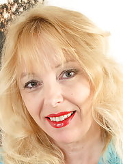 Big breasted British MILF getting wet on her bed