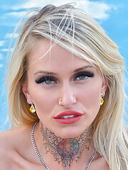 Tattooed MILF Stephanie Love With Pierced Nipples And Fake Boobs Shows Her Assets