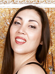 Brunette MILF Delly strip her sexy black dress and poses naked