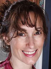 Skinny 41 year old Celeste Carpenter slips a strawberry in her pussy